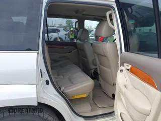 2004 Lexus GX 470 with VIN JTJBT20X440062559, listed as a IAAI auction lot 42142442 with 261,126 mi miles. Bid and sale history available at carsss.com. Image 8.