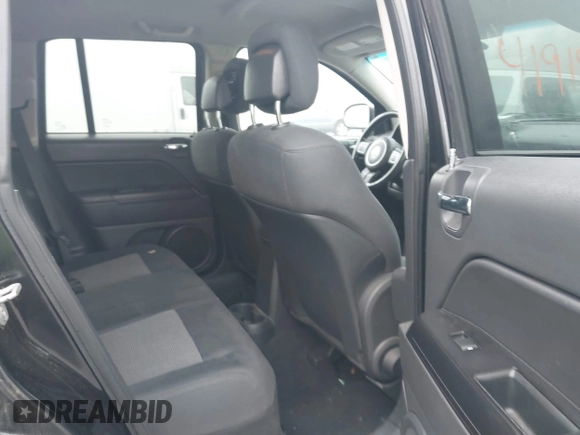 2011 Jeep Compass Latitude with VIN 1J4NF1FBXBD223378, listed as a IAAI auction lot 41919670 with 151,036 mi miles. Bid and sale history available at carsss.com. Image 8.