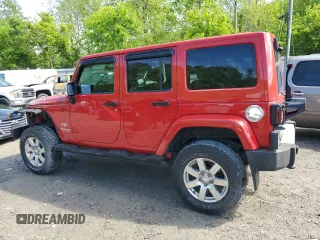 2012 Jeep Wrangler Unlimited Sahara with VIN 1C4BJWEG0CL128417, listed as a Copart auction lot 56243815 with 95,635 mi miles and Salvage title. Bid and sale history available at DreamBid. Image 2.