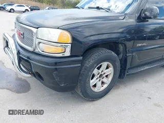 2003 GMC Yukon Denali z VIN 1GKEK63U13J340519, wystawiony jako IAAI lot #42035509 z przebiegiem 209 306 mil mil oraz . Historia ofert i sprzedaży dostępna na DreamBid. Obrazek 6.
