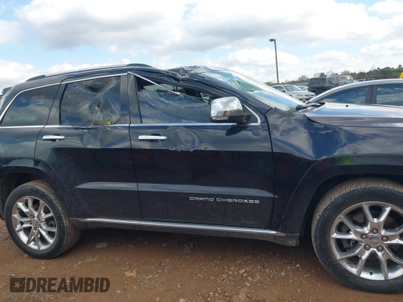 2015 Jeep Grand Cherokee Summit with VIN 1C4RJFJT1FC768707, listed as a IAAI auction lot 41863454 with 122,564 mi miles. Bid and sale history available at carsss.com. Image 13.
