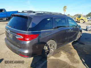 2018 Honda Odyssey Elite with VIN 5FNRL6H91JB052289, listed as a IAAI auction lot 41336068 with 94,685 mi miles and . Bid and sale history available at DreamBid. Image 4.