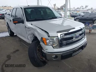2014 Ford F-150 XL with VIN 1FTFW1CT1EKE22892, listed as a IAAI auction lot 42172851 with 14,203 mi miles and . Bid and sale history available at DreamBid. Image 1.