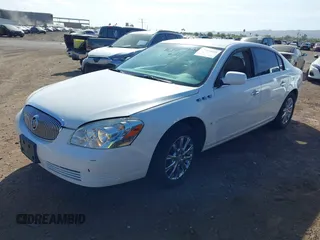 2009 Buick Lucerne CXL with VIN 1G4HD57M19U109257, listed as a IAAI auction lot 42064449 with 153,665 mi miles. Bid and sale history available at carsss.com. Image 2.