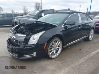 2013 Cadillac XTS Platinum z VIN 2G61V5S37D9194227, wystawiony jako IAAI lot #41510449 z przebiegiem 114 243 mil mil oraz . Historia ofert i sprzedaży dostępna na DreamBid. Obrazek 2.