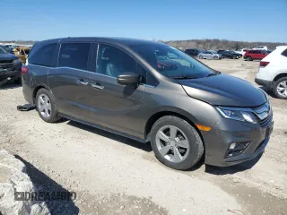 2018 Honda Odyssey EX-L with VIN 5FNRL6H78JB069850, listed as a Copart auction lot 49771875 with 103,914 mi miles and Salvage Title. Bid and sale history available at DreamBid. Image 4.