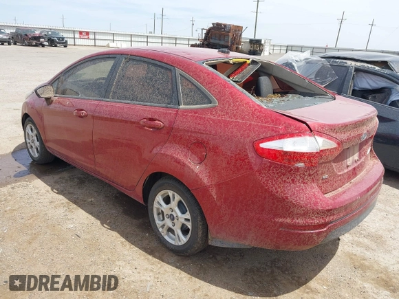 2016 Ford Fiesta SE z VIN 3FADP4BJXGM156814, wystawiony jako IAAI lot #42129721 z przebiegiem 90 353 mil mil oraz . Historia ofert i sprzedaży dostępna na DreamBid. Obrazek 3.