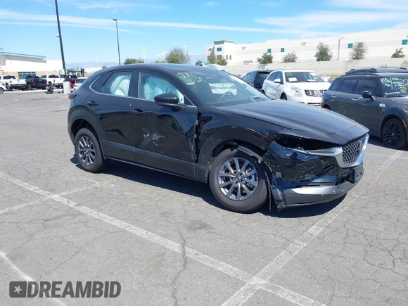 2024 Mazda CX-30 2.5 S with VIN 3MVDMBAM5RM687164, listed as a IAAI auction lot 41465592 with 4,705 mi miles. Bid and sale history available at carsss.com. Image 1.