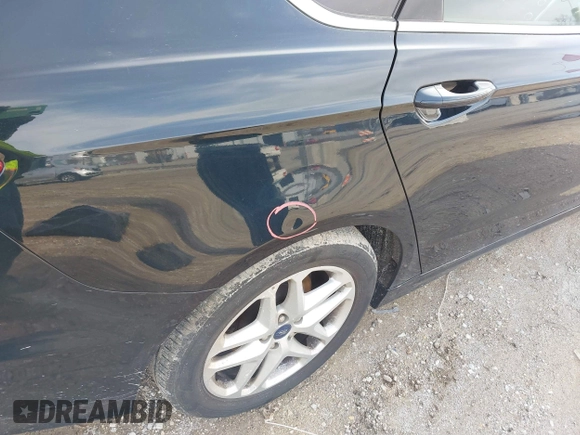 2014 Ford Fusion SE with VIN 3FA6P0H72ER156982, listed as a IAAI auction lot 41865154 with 215,319 mi miles and . Bid and sale history available at DreamBid. Image 15.