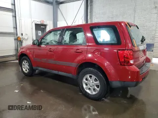2011 Mazda Tribute Touring with VIN 4F2CY0C71BKM06780, listed as a Copart auction lot 77748114 with 144,163 mi miles and Salvage Title. Bid and sale history available at carsss.com. Image 2.