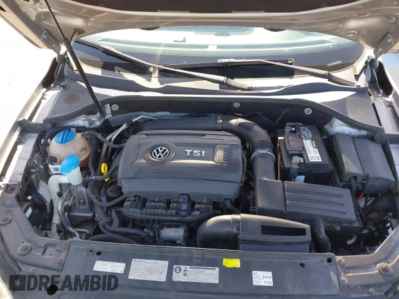 2014 Volkswagen Passat Wolfsburg Edition z VIN 1VWAT7A39EC055174, wystawiony jako IAAI lot #42433368 z przebiegiem 81 321 mil mil oraz . Historia ofert i sprzedaży dostępna na DreamBid. Obrazek 10.