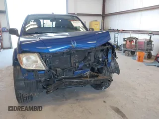 2014 Nissan Frontier SV with VIN 1N6AD0ER0EN766382, listed as a IAAI auction lot 41687781 with 143,804 mi miles and . Bid and sale history available at DreamBid. Image 12.