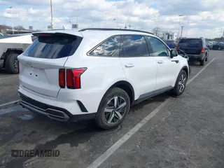 2023 Kia Sorento S with VIN 5XYRL4LCXPG249082, listed as a IAAI auction lot 41442876 with 13,701 mi miles and . Bid and sale history available at DreamBid. Image 4.