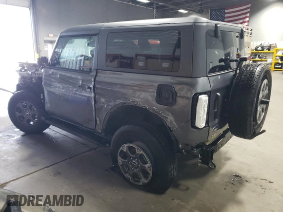 2023 Ford Bronco z VIN 1FMDE5AH9PLB83620, wystawiony jako Copart lot #60644035 z przebiegiem 6 700 mil mil oraz Szkoda całkowita • Salvage title. Historia ofert i sprzedaży dostępna na DreamBid. Obrazek 2.