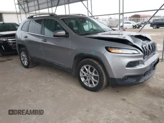 2017 Jeep Cherokee Latitude with VIN 1C4PJLCS2HW596098, listed as a IAAI auction lot 41409241 with 93,569 mi miles and . Bid and sale history available at carsss.com. Image 1.
