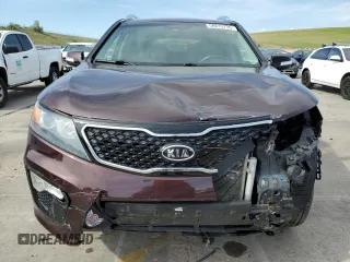 2013 Kia Sorento SX z VIN 5XYKWDA22DG389884, wystawiony jako Copart lot #58813735 z przebiegiem 101 567 mil mil oraz Szkoda całkowita • Salvage title. Historia ofert i sprzedaży dostępna na DreamBid. Obrazek 5.
