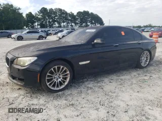 2013 BMW 7 Series 750i with VIN WBAYA8C58DC996414, listed as a Copart auction lot 62928835 with 174,807 mi miles and Clean title. Bid and sale history available at DreamBid. Image 1.
