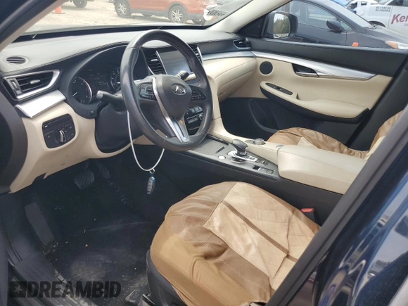 2019 Infiniti QX50 Luxe with VIN 3PCAJ5M14KF142261, listed as a Copart auction lot 55122875 with 125,200 mi miles and Salvage title. Bid and sale history available at DreamBid. Image 7.