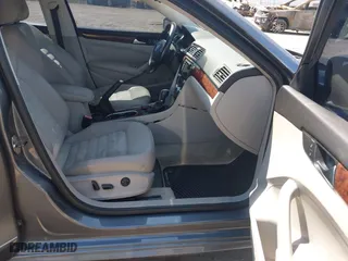 2013 Volkswagen Passat SEL Premium with VIN 1VWCM7A34DC055684, listed as a IAAI auction lot 42039636 with 167,746 mi miles. Bid and sale history available at carsss.com. Image 5.