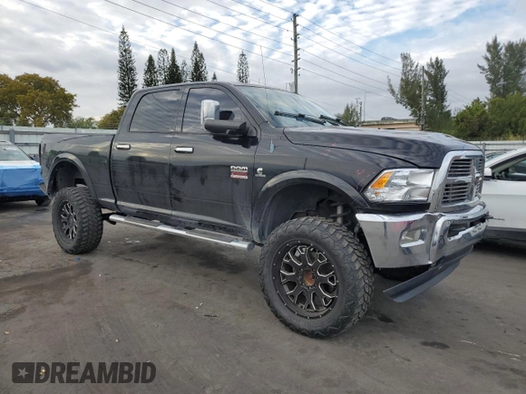 2012 Ram 2500 Laramie with VIN 3C6UD5FL2CG199239, listed as a Copart auction lot 87841525 with 83,183 mi miles and Salvage Title. Bid and sale history available at carsss.com. Image 4.