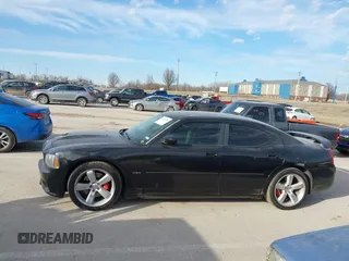 2006 Dodge Charger SRT-8 with VIN 2B3LA73W96H371246, listed as a IAAI auction lot 41676168 with 130,064 mi miles and . Bid and sale history available at carsss.com. Image 14.