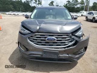 2020 Ford Edge SEL с VIN 2FMPK3J92LBA30123, выставлен на аукционе Copart как лот 63192805 с пробегом 119 534 миль миль и Списание • Salvage title. История ставок и продаж доступна на DreamBid. Изображение 5.