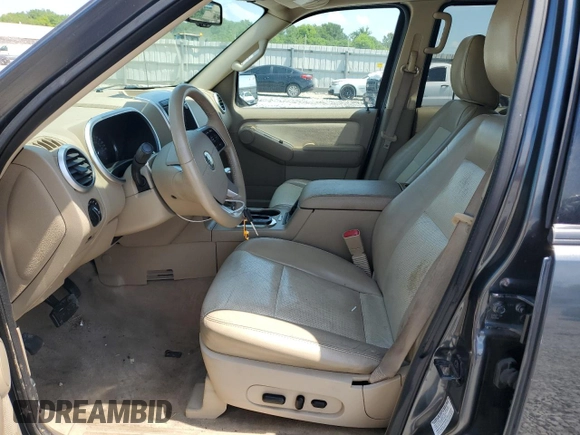 2010 Mercury Mountaineer Premier z VIN 4M2EN4J85AUJ03857, wystawiony jako Copart lot #56787845 z przebiegiem 215 256 mil mil oraz Szkody całkowita. Historia ofert i sprzedaży dostępna na DreamBid. Obrazek 7.