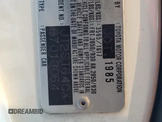 1986 Toyota Celica z VIN JT2ST64CXG7013064, wystawiony jako Copart lot #44228575 z przebiegiem 101 881 mil mil oraz Szkoda całkowita • Salvage title. Historia ofert i sprzedaży dostępna na DreamBid. Obrazek 12.