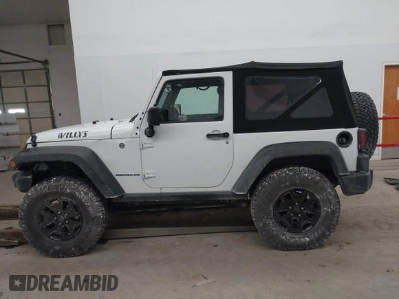 2016 Jeep Wrangler Sport with VIN 1C4AJWAG9GL261958, listed as a IAAI auction lot 41595490 with 32,433 mi miles and . Bid and sale history available at carsss.com. Image 14.