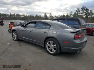 2011 Dodge Charger RT Max with VIN 2B3CM5CTXBH610699, listed as a Copart auction lot 79752424 with 153,630 mi miles and Salvage Title. Bid and sale history available at carsss.com. Image 2.