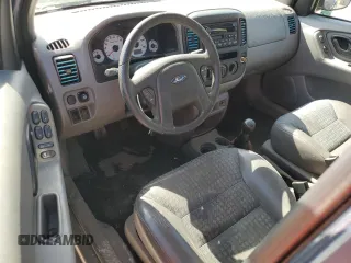 2001 Ford Escape XLS with VIN 1FMYU01BX1KB53168, listed as a Copart auction lot 76547834 with 71,025 mi miles and Salvage title. Bid and sale history available at DreamBid. Image 8.