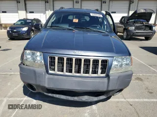 2004 Jeep Grand Cherokee Laredo with VIN 1J4GX48S74C195326, listed as a Copart auction lot 53993785 with 280,456 mi miles and Salvage title. Bid and sale history available at DreamBid. Image 5.