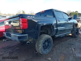2014 Chevrolet Silverado 1500 LTZ with VIN 3GCUKSECXEG406378, listed as a IAAI auction lot 41588418 with 250,256 mi miles. Bid and sale history available at carsss.com. Image 4.