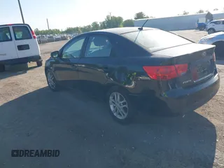 2011 Kia Forte EX with VIN KNAFU4A27B5332784, listed as a IAAI auction lot 42152645 with 237,077 mi miles. Bid and sale history available at carsss.com. Image 3.
