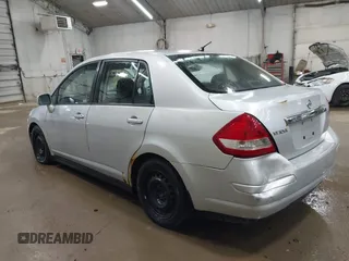 2011 Nissan Versa S with VIN 3N1BC1AP5BL465531, listed as a IAAI auction lot 42124083 with 249,641 mi miles and . Bid and sale history available at DreamBid. Image 3.