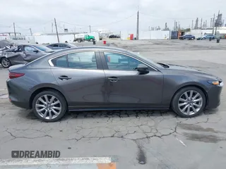 2021 Mazda 3 Preferred with VIN 3MZBPACL4MM214814, listed as a IAAI auction lot 42115140 with 28,860 mi miles and . Bid and sale history available at DreamBid. Image 13.