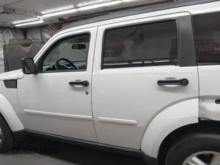 2007 Dodge Nitro SLT with VIN 1D8GU58K97W583408, listed as a IAAI auction lot 41653696 with 124,449 mi miles. Bid and sale history available at carsss.com. Image 14.