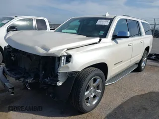 2015 Chevrolet Suburban LTZ with VIN 1GNSCKKC2FR741040, listed as a IAAI auction lot 41709574 with 87,795 mi miles and . Bid and sale history available at DreamBid. Image 17.