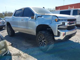 2021 Chevrolet Silverado 1500 LT z VIN 3GCUYDET0MG321252, wystawiony jako IAAI lot #41847215 z przebiegiem 119 283 mil mil oraz . Historia ofert i sprzedaży dostępna na DreamBid. Obrazek 1.