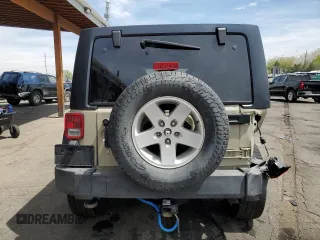 2018 Jeep Wrangler Unlimited Sport S with VIN 1C4BJWDG1JL899029, listed as a Copart auction lot 54361235 with 117,655 mi miles and Salvage Title. Bid and sale history available at DreamBid. Image 6.