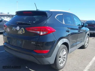 2016 Hyundai Tucson SE with VIN KM8J3CA41GU133962, listed as a IAAI auction lot 41634282 with 101,705 mi miles. Bid and sale history available at carsss.com. Image 4.