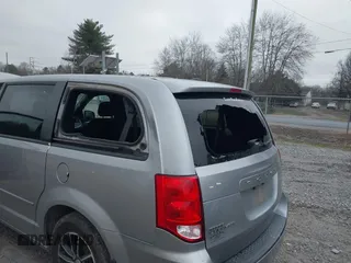 2016 Dodge Grand Caravan SE with VIN 2C4RDGBG1GR401894, listed as a IAAI auction lot 41519412 with 198,444 mi miles and . Bid and sale history available at DreamBid. Image 6.