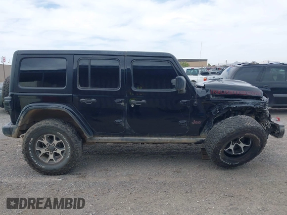 2022 Jeep Wrangler Unlimited Rubicon with VIN 1C4HJXFN2NW134024, listed as a IAAI auction lot 42248188 with 41,899 mi miles and . Bid and sale history available at DreamBid. Image 13.