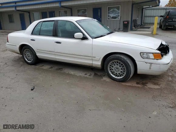 1998 Mercury Grand Marquis GS with VIN 2MEFM74WXWX619140, listed as a Copart auction lot 77300894 with 124,064 mi miles and Salvage Title. Bid and sale history available at carsss.com. Image 4.