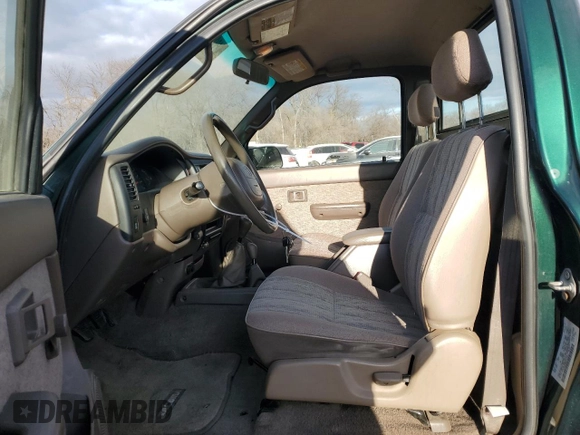 1999 Toyota Tacoma with VIN 4TAPM62N6XZ417283, listed as a Copart auction lot 84322844 with 74,233 mi miles and Clean Title. Bid and sale history available at DreamBid. Image 7.