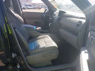 2011 Honda Pilot EX-L with VIN 5FNYF4H55BB039843, listed as a IAAI auction lot 41791186 with 126,737 mi miles. Bid and sale history available at carsss.com. Image 5.