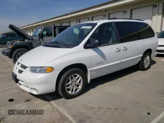 2000 Dodge Caravan SE with VIN 2B4GP44G7YR678333, listed as a Copart auction lot 52493975 with 329,184 mi miles and Salvage title. Bid and sale history available at DreamBid. Image 1.