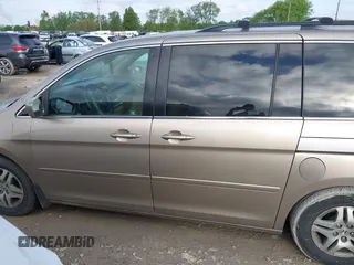 2006 Honda Odyssey EX-L z VIN 5FNRL38756B458936, wystawiony jako IAAI lot #42201902 z przebiegiem 339 976 mil mil oraz . Historia ofert i sprzedaży dostępna na DreamBid. Obrazek 14.