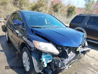 2010 Mazda CX-7 Sport with VIN JM3ER2W59A0328990, listed as a IAAI auction lot 41787431 with 163,443 mi miles and . Bid and sale history available at DreamBid. Image 1.