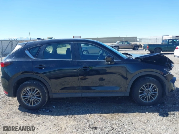 2017 Mazda CX-5 Sport with VIN JM3KFBBL2H0144792, listed as a IAAI auction lot 41654031 with 77,107 mi miles. Bid and sale history available at carsss.com. Image 13.